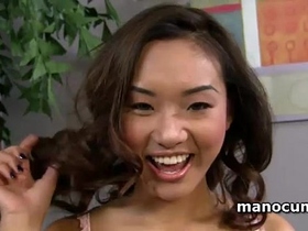 Asian sex siren sensually taking off lingerie and rubbing dick