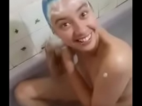 Blue hair Asian sucking cock