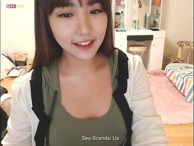 Pretty korean girl recording on camera 3